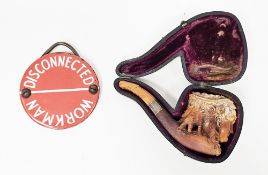 Cased meerschaum pipe, carved in the form of a woman wearing a bonnet, the amber mouthpiece a/f,