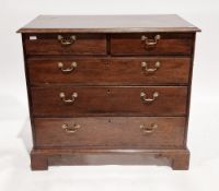 Oak chest of drawers in the George III manner, the rectangular top with ogee moulded edge over two