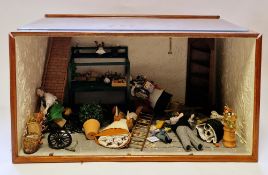 Quantity of bisque and wax doll's house dolls and accessories to include bicycle, corner cabinet,