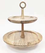 Gavivi mangowood two-tier graduated circular cakestand, 42cm high and an Oka Gonia waste paper bin