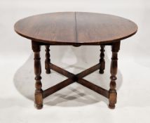 In the manner of Titchmarsh & Goodwin oak extending dining room table in the 17th century style, the