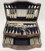 George Butler & Co. (Sheffield) stainless steel and ivorine initialled oak canteen of cutlery, all