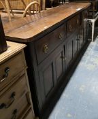 19th century oak dresser base, the rectangular top with rounded front corners, over three deep