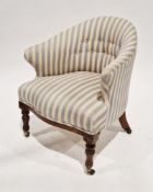 19th century tub armchair, upholstered in a blue, pink and cream striped fabric having button