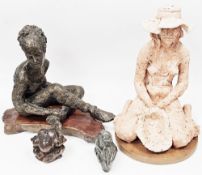 Collection of six figures including an African Shona stone family sculpture, 44cm high, another