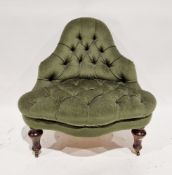 19th century corner nursing chair upholstered in a green buttoned fabric, with shaped back, on