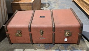 Early 20th century canvas covered and wooden bound travelling trunk, with leather handles, 32cm high