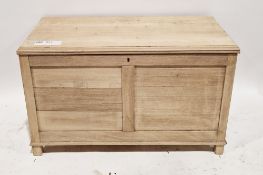 Pale oak blanket box or coffer in the 19th century manner, the hinged lid opening to an empty space,