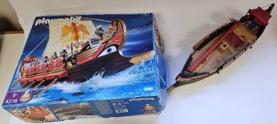 Two built Playmobil sets to include 5738 Catapult Castle and 4276 Roman Warrior's Ship both with box