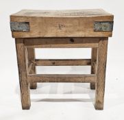 Kitchen sized metal-bound butcher's block held on a pine stand with square support, 84cm high x 77cm