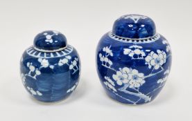 Two Chinese porcelain blue and white ginger jars and covers, Qing Dynasty, possibly later, in sizes,