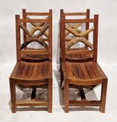 Set of four hardwood dining chairs, natural wood crossed splats, solid seats, on square supports,