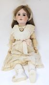 French S.F.B.J Paris bisque head doll, with sleeping blue eyes, open mouth with teeth, composite