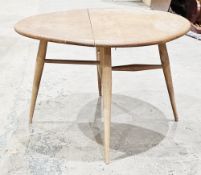 Ercol pale elm and beech drop-leaf coffee table,  model no.308, 41cm wide x 61cm diameter,
