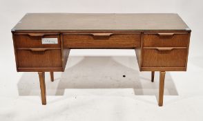 Mid-century Austinsuite teak dressing table comprising an arrangement of five drawers with rolled
