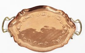 Early 20th century Art Nouveau copper tray of shaped oval form, embossed fruit and foliage