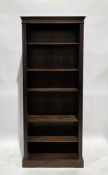 Modern tall oak bookcase, the moulded cornice with dentil carving, five shelves, reeded column