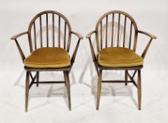 Pair of Ercol beech and elm elbow dining chairs model 370A, with hooped and stick backs, with gold