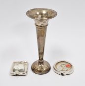 Small silver vase of trumpet shape (weighted base) and two miniature silver photograph frames (