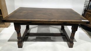 Titchmarsh and Goodwin oak draw-leaf dining table, the rectangular top with cleated ends, on block