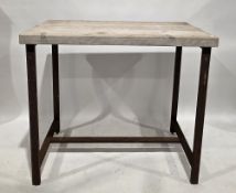 Industrial-style tall bar table with pine scaffold plank top, on a rusted metal base with straight
