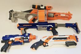 Nerf Elite Blaster Rack containing a quantity of Nerf Guns, Darts, and other toys to include