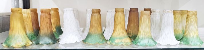 Collection of sixteen Art Nouveau style mottled amber and green coloured glass lamp shades