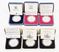 Six cased Royal Mint silver proof commemorative crowns including two Queen's silver jubilee, two