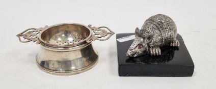 Mexican silver model of an armadillo, on square base, 5cm high and a silver tea strainer and