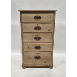 20th century pine chest of five short graduated drawers with brass oval drop loop handles, on