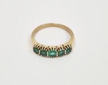 9ct gold five stone set ring, with five green stones in claw setting, stamped 375, 2.75 grams