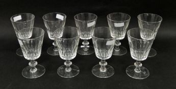 Nine 20th century panel cut rummers in the Regency style, each with a panel cut cylindrical bowl