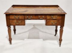 19th century partly figured walnut kneehole writing table with an arrangement of five short
