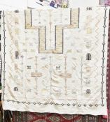 Large Moroccan/Berber cream ground rug with central cross on geometric and floral pattern field,