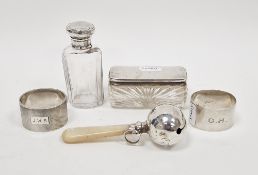 Edwardian silver-mounted cut-glass scent bottle a silver-mounted glass pin box, two napkin rings,