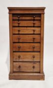 19th century mahogany wellington chest of seven drawers, having shaped cornice, straight frieze
