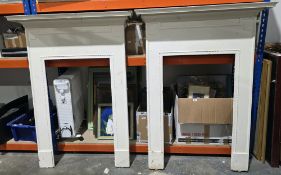 Pair of 19th century cast iron fire surrounds with a ropetwist decoration, later painted white,