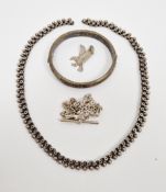 Victorian silver-coloured chain, the circular links decorated with stars and beads below (missing