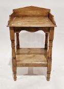 Late 19th/early 20th century pine washstand with three-quarter gallery back, pot shelf below, on