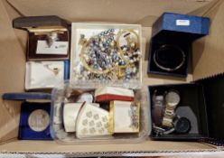 Silver child's bracelet, two silver locket pendants on chains and another silver pendant together