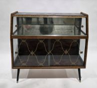 1950's walnut-framed glass display cabinet, the top with a glass black panel decorated with gold-