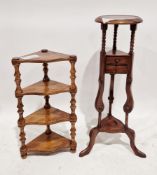 Hardwood washstand in the George III manner, the circular top on three supports united by two