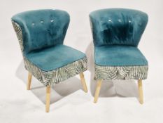 Pair of modern Aadil accent chairs upholstered in a green button back velvet and leaf pattern