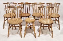 Set of five Victorian beechwood penny dining chairs, having spindle backs, solid round seats, on