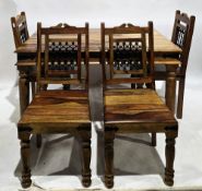 Modern mango wood dining table, the rectangular top with iron straps to sides, on turned tapering