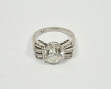 Platinum and diamond ring, the central brilliant cut diamond (approx 2.5ct) surrounded by diamond