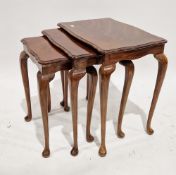 Mahogany nest of three tables of rectangular form with shaped tops, on cabriole legs with pad