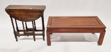 Chinese hardwood coffee table of rectangular form, on stylised square legs, 41cm high x 102cm wide x
