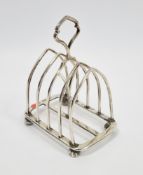 Victorian silver four-division toastrack by Edward Gilbert, London 1882, of pointed arch design, 9cm