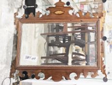 Mahogany and parcel gilt mirror in the George III manner, he fretwork frame inlaid with shell